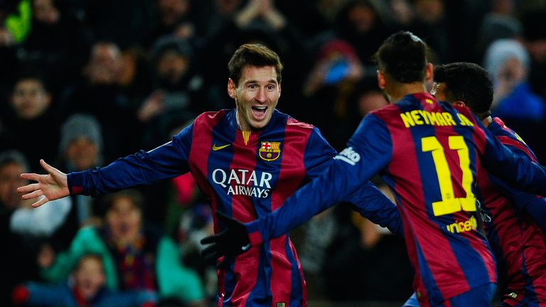 Lionel Messi celebrates with Neymar