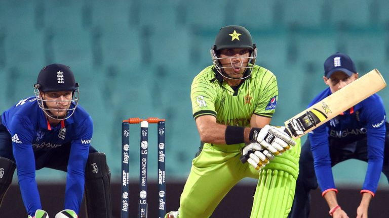 Misbah-ul-Haq plays a reverse sweep as Jos Buttler and Joe Root look on