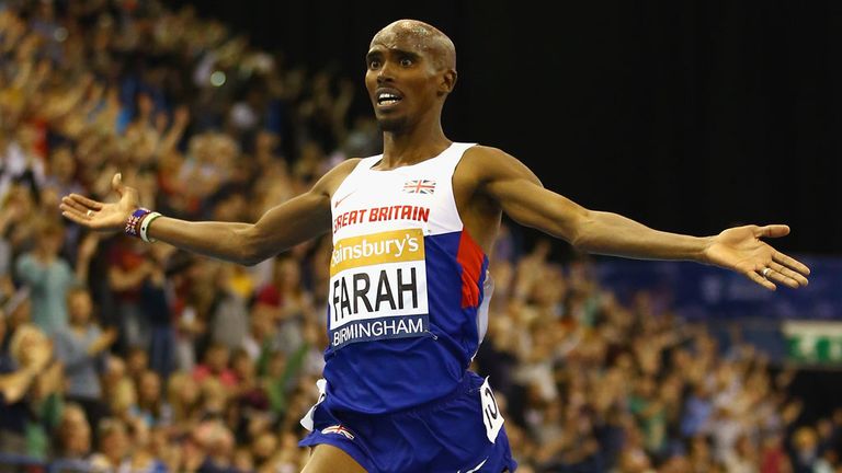 Mo Farah crosses the line as he breaks the indoor two-mile record in Birmingham