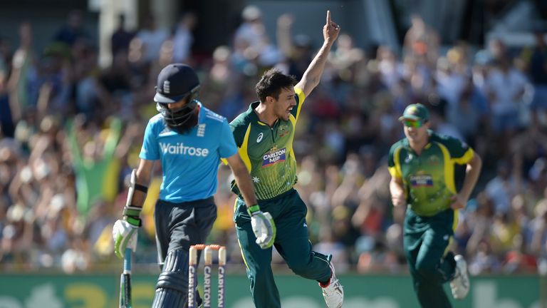 Mitchell Johnson of Australia celebrates dismissing Moeen Ali