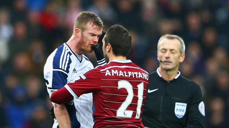 Seeing red - West Ham's Morgan Amalfitano pushes Chris Brunt of West Brom in the face and is sent off