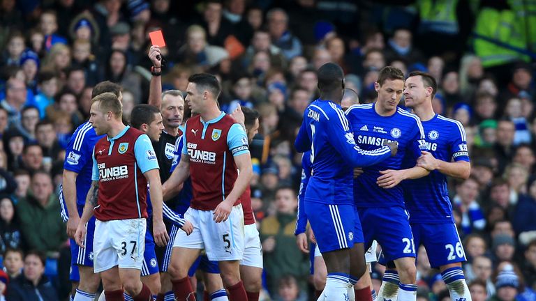 Chelsea's Nemanja Matic (2nd right) is shown a red card
