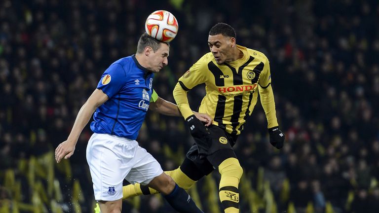 Young Boys' Guillaume Hoarau (R) vies for the ball with Everton's Phil Jagielka