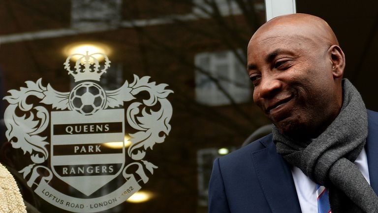 QPR caretaker manager Chris Ramsey smiles as he speaks with fans outside the stadium before his inaugural test against Southampton