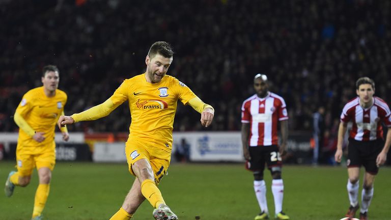 Paul Gallagher of Preston North End scores the third goal  from the penalty spot 