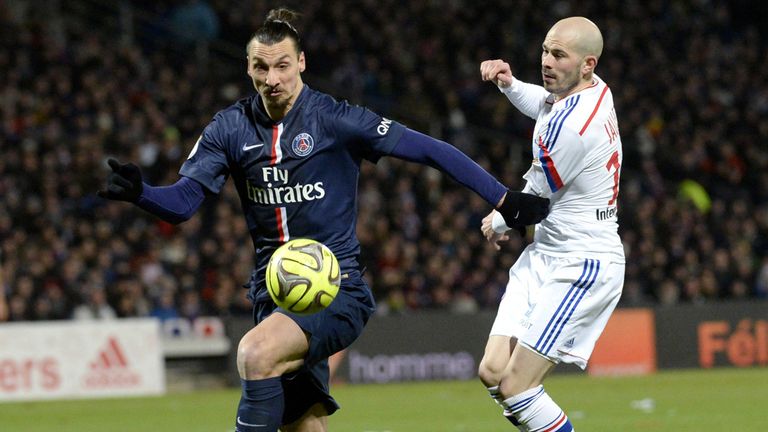 Lyon's French defender Christophe Jallet (R) vies with Paris Saint-Germain's Swedish midfielder Zlatan Ibrahimovic