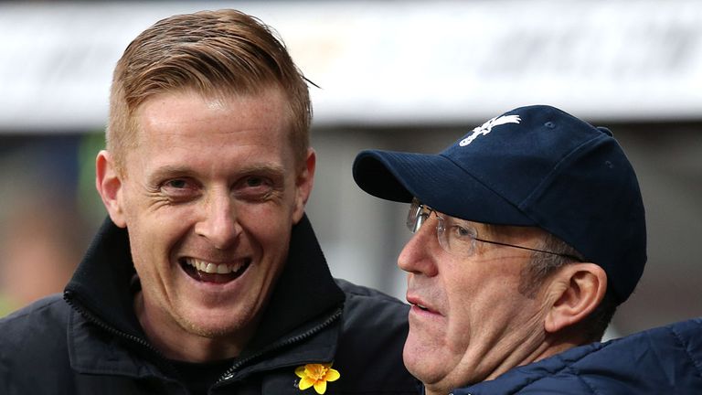 Garry Monk shares a joke with Tony Pulis