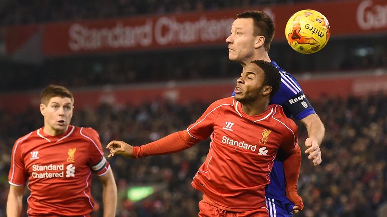 Raheem Sterling vies with John Terry during the League Cup semi-final first leg between Liverpool and Chelsea at Anfield (PAUL ELLIS/AFP/Getty Images)