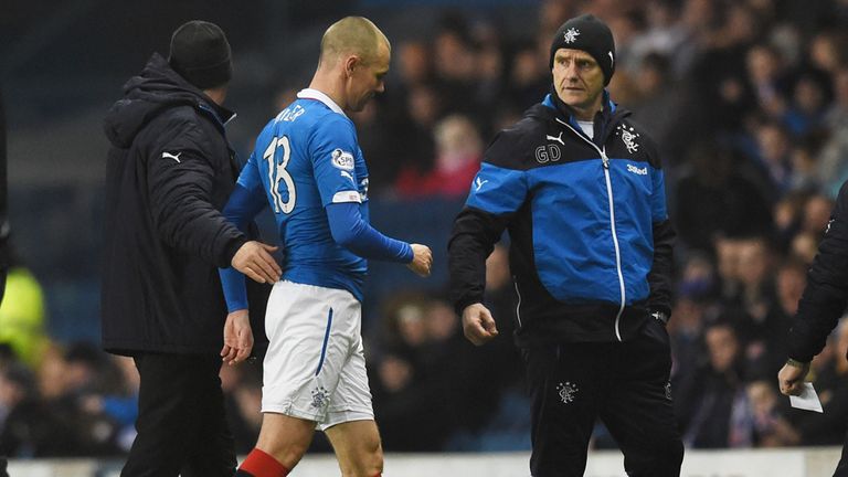 Kenny Miller walks off the pitch after picking up an injury 