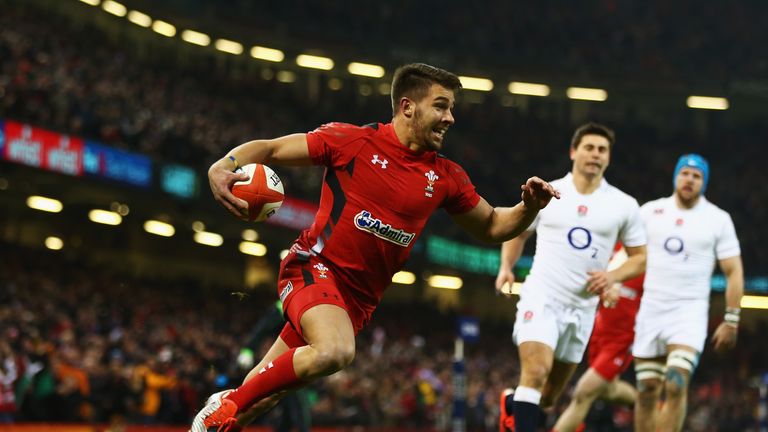 Rhys Webb of Wales goes over to score the opening try against England