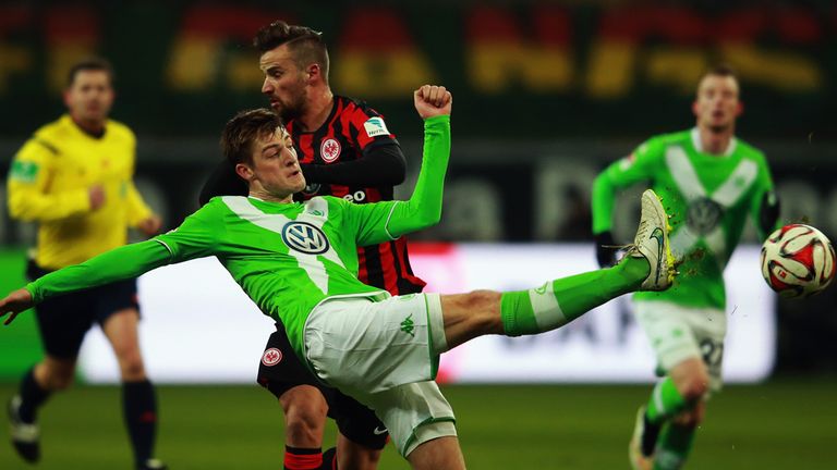 Robin Knoche of Wolfsburg knocks the ball away
