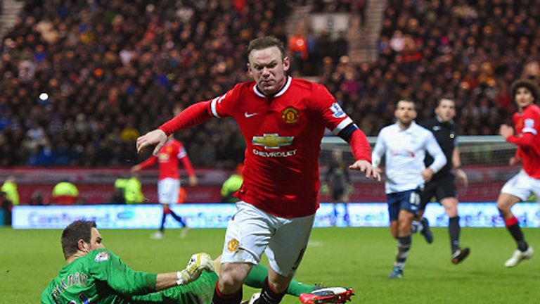 Wayne Rooney appeared to dive to earn Manchester United a penalty, which he converted for their third goal