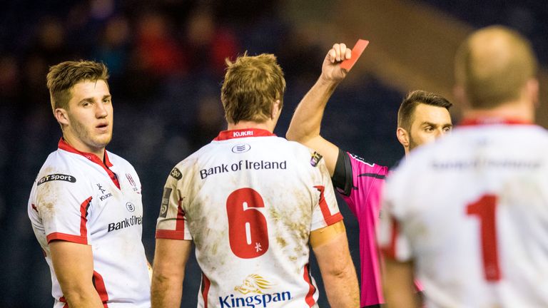 Ulster's Stuart McCloskey (left) is shown a red card by referee Leighton Hodges