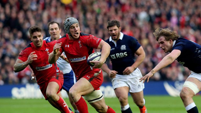 Jonathan Davies of Wales goes past Richie Gray of Scotland to score his team's second try