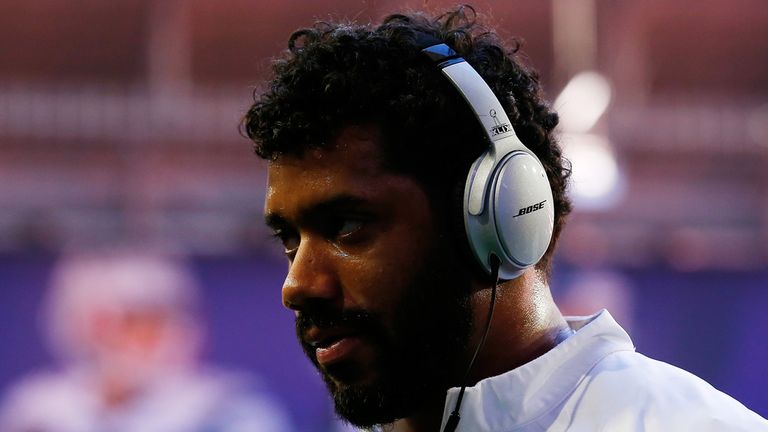 GLENDALE, AZ - FEBRUARY 01:   Russell Wilson #3 of the Seattle Seahawks stands on the field prior to Super Bowl XLIX at University of Phoenix Stadium on Fe