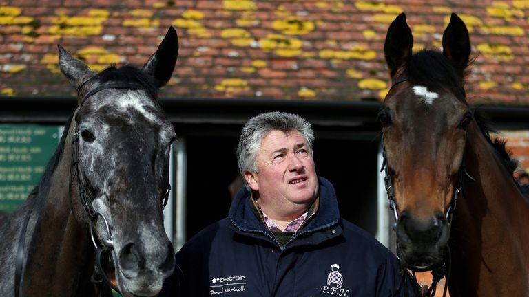 Trainer Paul Nicholls pictured with Saphir Du Rheu and Zarkandar during the visit to Manor Farm Stables, Ditcheat.