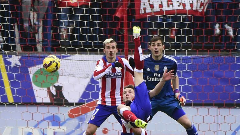 Atletico Madrid's midfielder Saul Niguez kicks the ball to score during the match Club Atletico de Madrid vs Real Madrid CF at the Vicente Calderon 