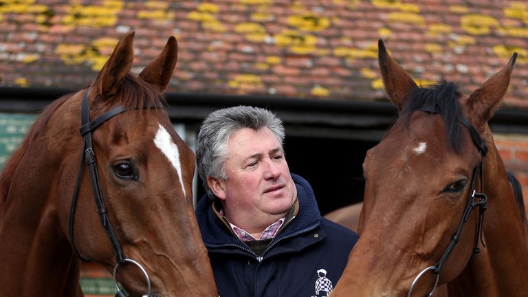 Trainer Paul Nicholls pictured with Silviniaco Conti and Sam Winner during the visit to Manor Farm Stables, Ditcheat.