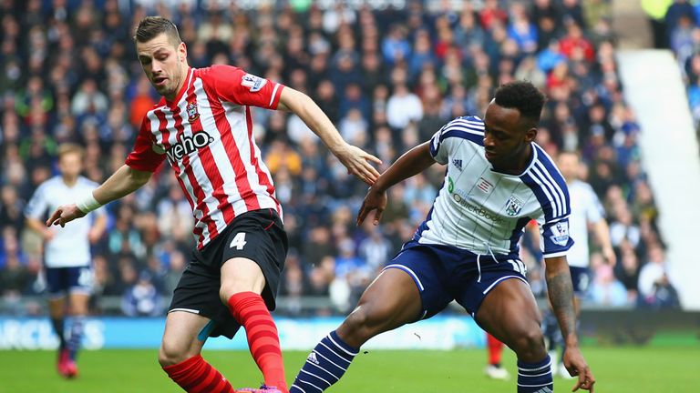 Saido Berahino of West Bromwich Albion and Morgan Schneiderlin of Southampton battle for the ball.
