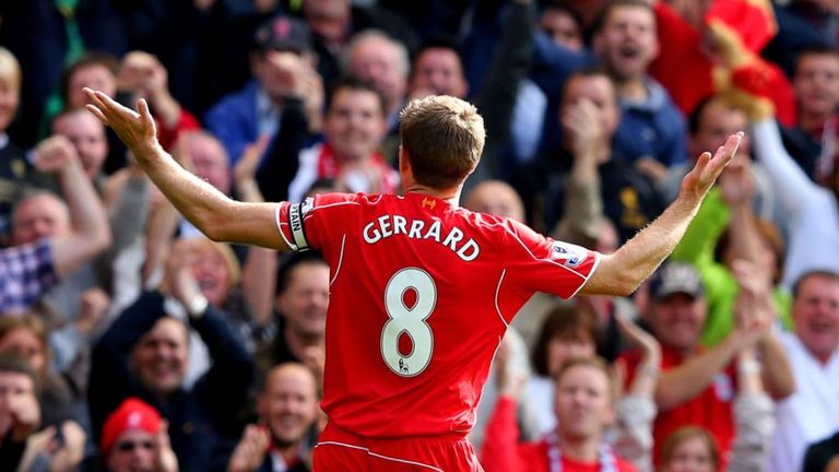 Steven Gerrard celebrates scoring a free-kick for Liverpool against Everton in September 2014