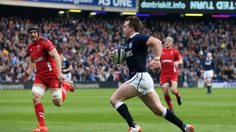 Stuart Hogg of Scotland  scores a try against Wales