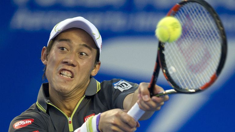 Kei Nishikori returns the ball to Kevin Anderson during their ATP Mexico Open semi-final