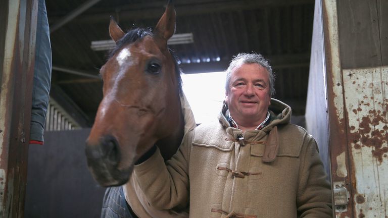 Trainer Nigel Twiston-Davies is pictured with his Champion Hurdle hope The New One