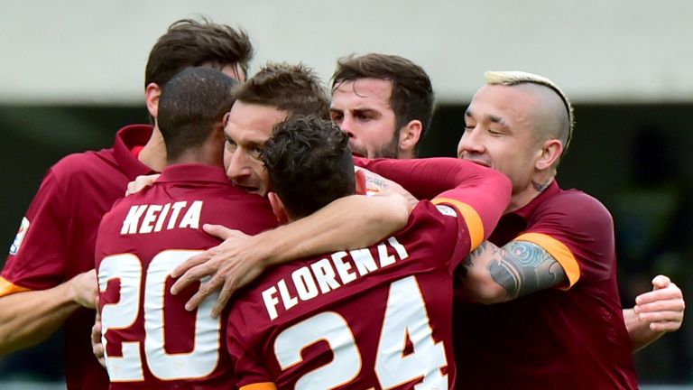 Roma's forward Francesco Totti celebrates after scoring against Verona