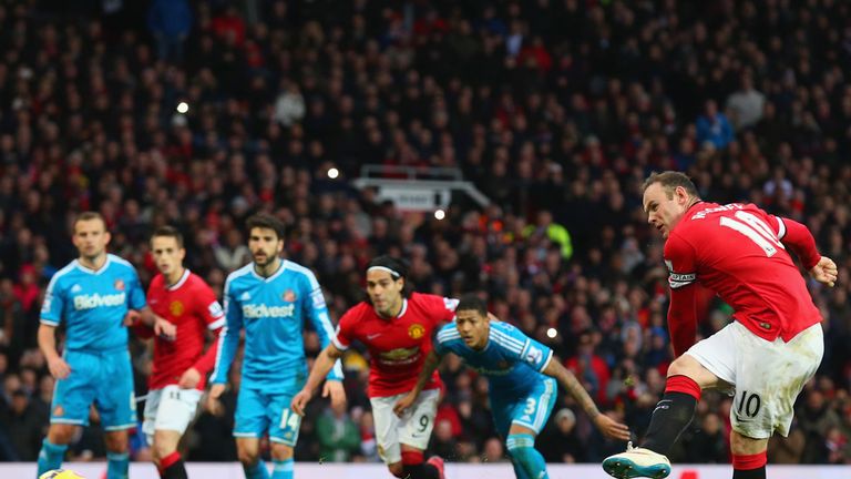 Wayne Rooney scores the opening goal from the penalty spot 