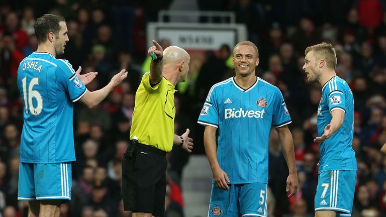 Wes Brown is wrongly sent off by Referee Roger East during the match between Manchester United and Sunderland at Old Trafford on February 28, 2015