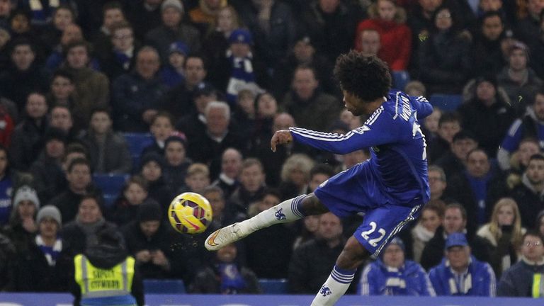 Willian shoots to score the only goal of the game between Chelsea and Everton at Stamford Bridge 