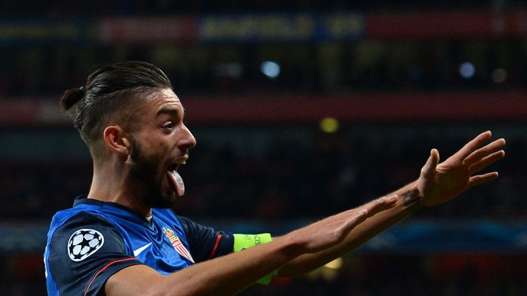 Monaco midfielder Yannick Ferreira Carrasco celebrates scoring his team's third goal during the UEFA Champions League match between Arsenal and Monaco