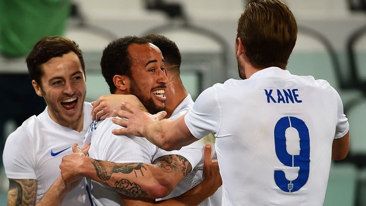 Andros Townsend celebrates with England teammates after scoring against Italy