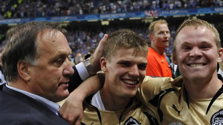 Zenit St Petersburg head coach Dutchman Dick Advocaat celebrates with Russian forward Igor Denisov (C) and Russian defender Aleksandr Anyukov 