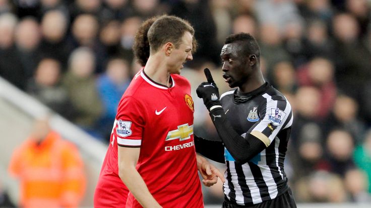 Jonny Evans and Papiss Cisse argue the point at St James'