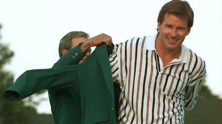 Sir Nick Faldo: Collects his jacket from 1995 winner Ben Crenshaw