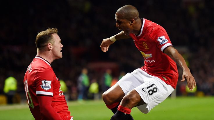 Wayne Rooney is congratulated by Ashley Young 