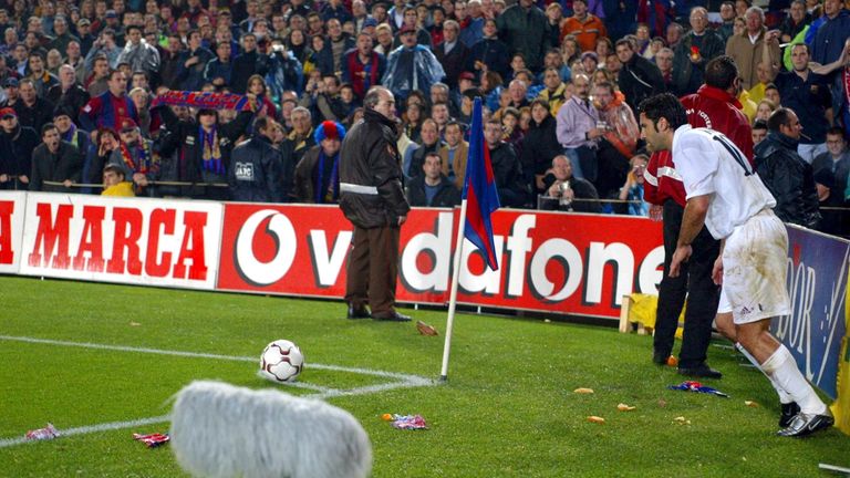 stupid-skunk802: luis figo wearing half real madrid and half barcelona  jersey taking action with fullbody view