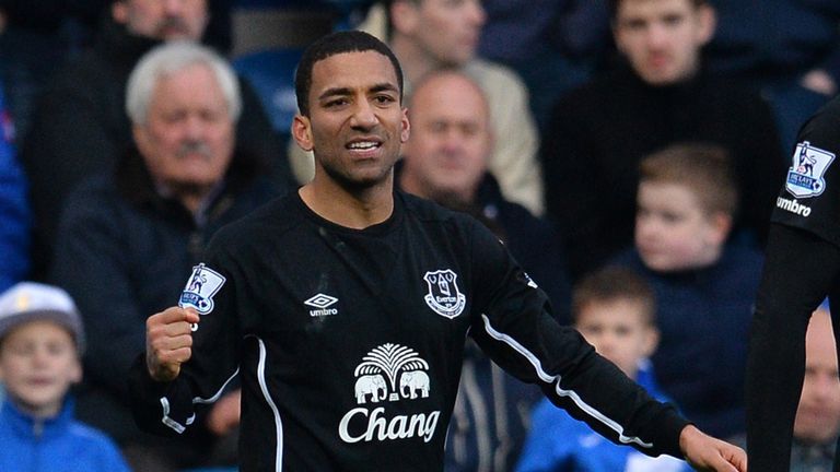 Everton's midfielder Aaron Lennon celebrates scoring against QPR at Loftus Road