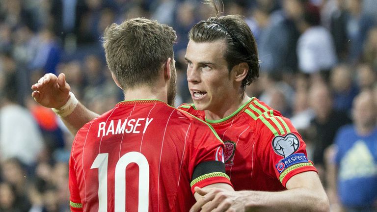 Wales' midfielder Gareth Bale celebrates his goal with teammate Aaron Ramsey