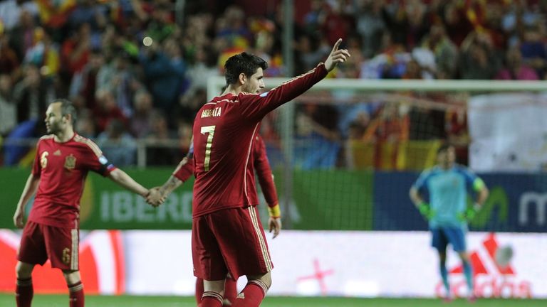 Spain's forward Alvaro Morata (C) celebrates after scoring a goal against Ukraine