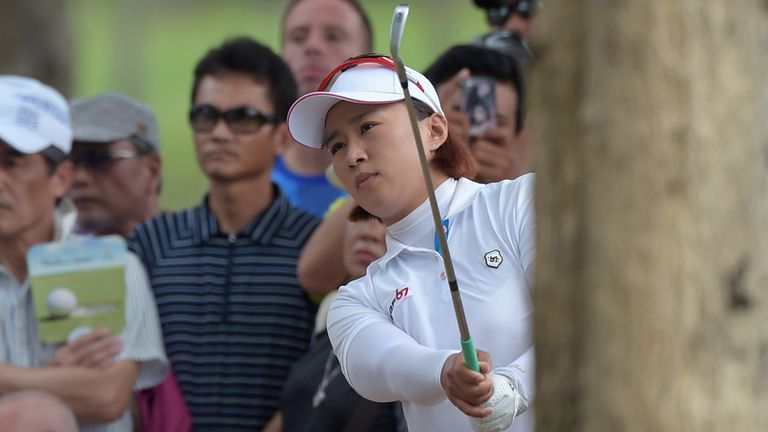 Amy Yang plays out of trouble during the final round in Thailand where the South Korean posted a 69 to claim the second LPGA Tour title of her career