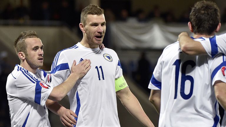 Bosnia and Herzegovina's forward  Edin Dzeko celebrates after completing his hat-trick against Andorra
