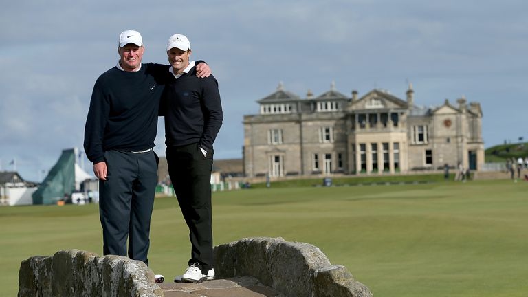 Andrew Strauss with professional playing parter Richard Finch on the Swilken Bridge during the Alfred Dunhill Links Championship at St Andrews