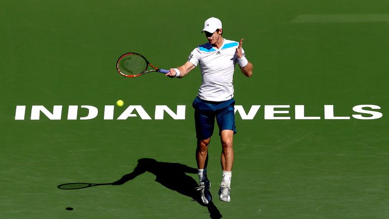 Andy Murray of Great Britain returns a shot to Milos Roanic of Canada during the BNP Parabas Open at the Indian Wells Tennis 
