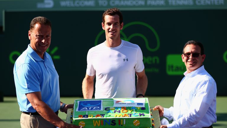 Andy Murray of Great Britain poses with a cake for his 500th ATP Tour victory against Kevin Anderson of South Africa
