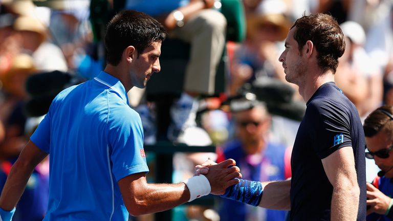 Novak Djokovic of Serbia is congratulated by Andy Murray of Great Britain after Djokovic won in straight sets
