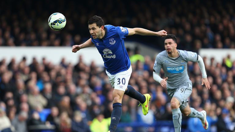 Antolin Alcaraz of Everton heads the ball during the match against Newcastle 
