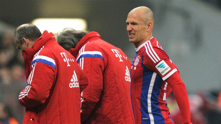 Arjen Robben of FC Bayern Muenchen comes off injured during the Bundesliga match between Bayern Muenchen and Borussia Moenchengladbach.