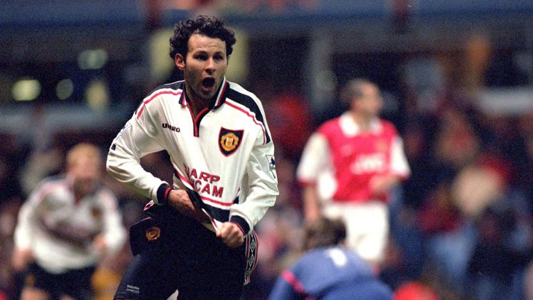 Ryan Giggs of Manchester United celebrates after scoring the winning goal during the FA Cup  Semi Final match against Arsenal at Villa Park in April 1999